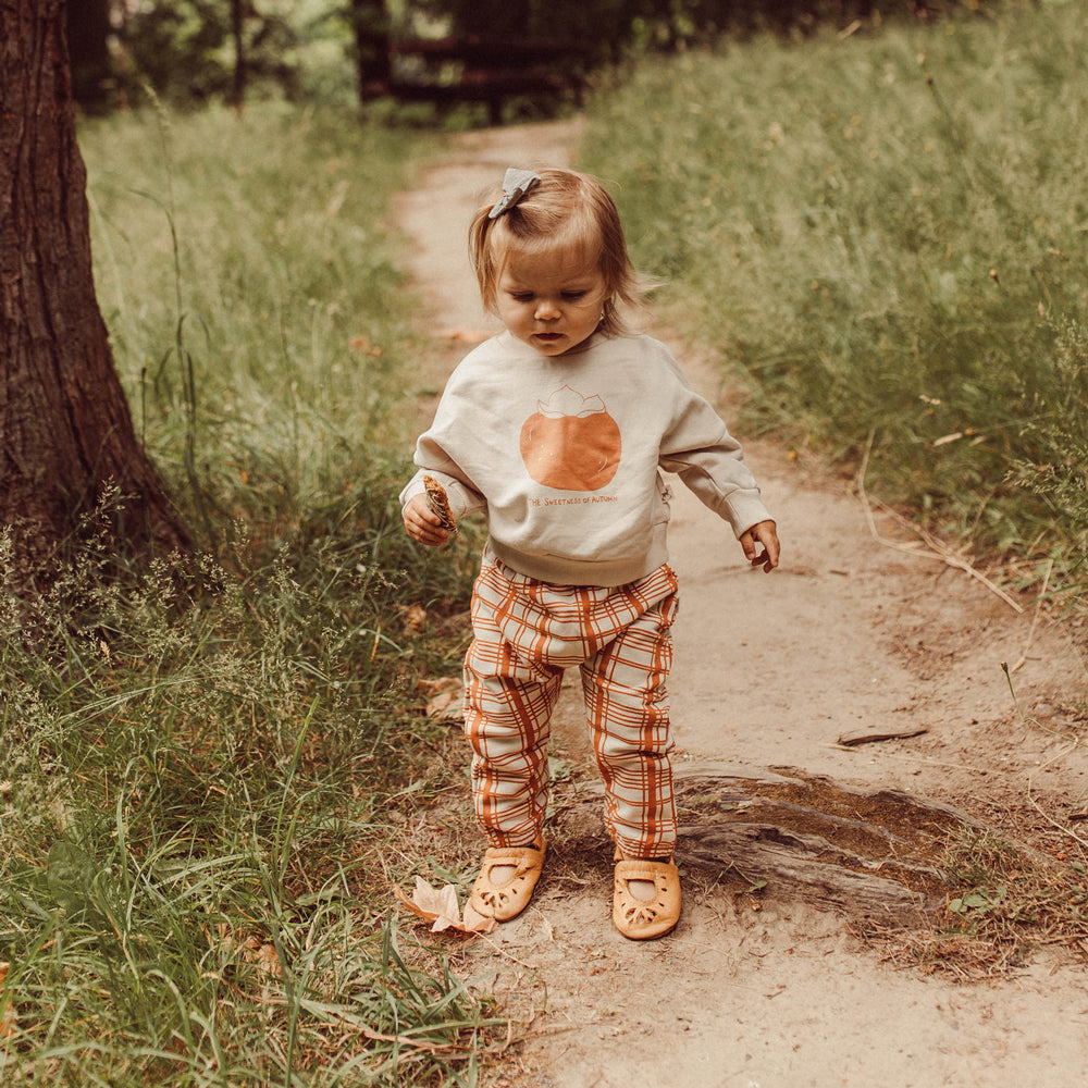 'the sweetness of autumn (plums)' white sand sweatshirt