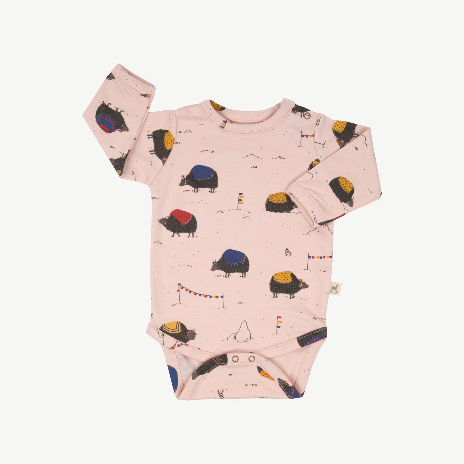 'yak's journey' peach whip onesie