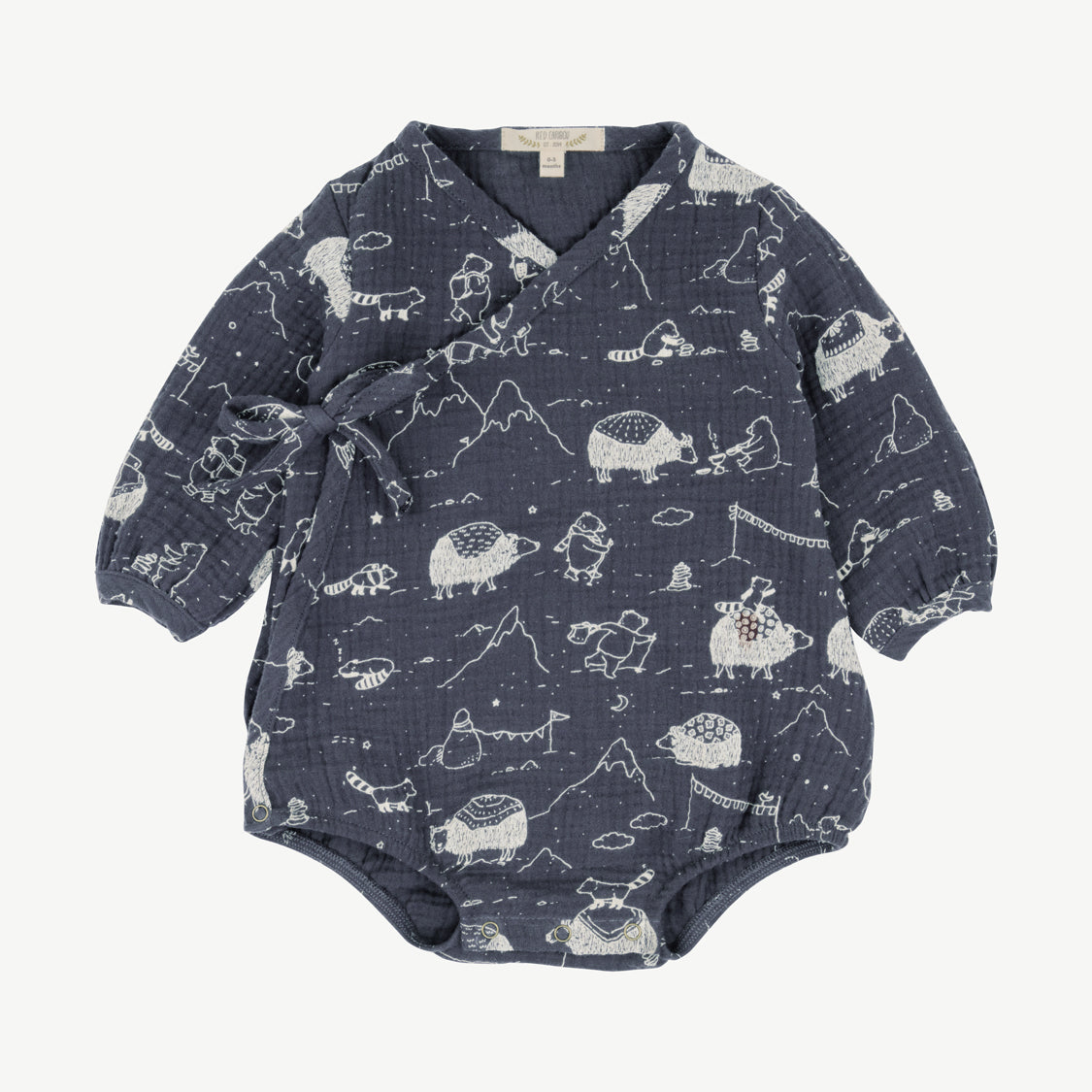 'the story' beluga muslin onesie