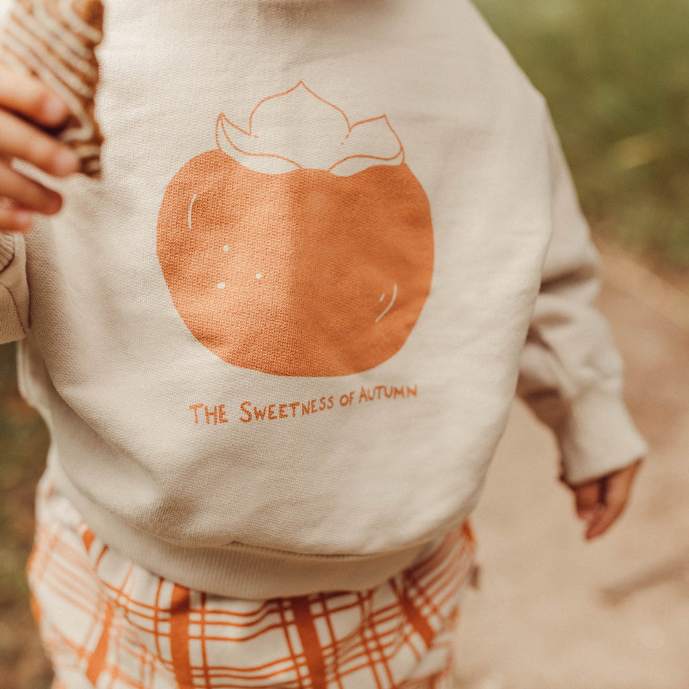 'the sweetness of autumn (plums)' white sand sweatshirt
