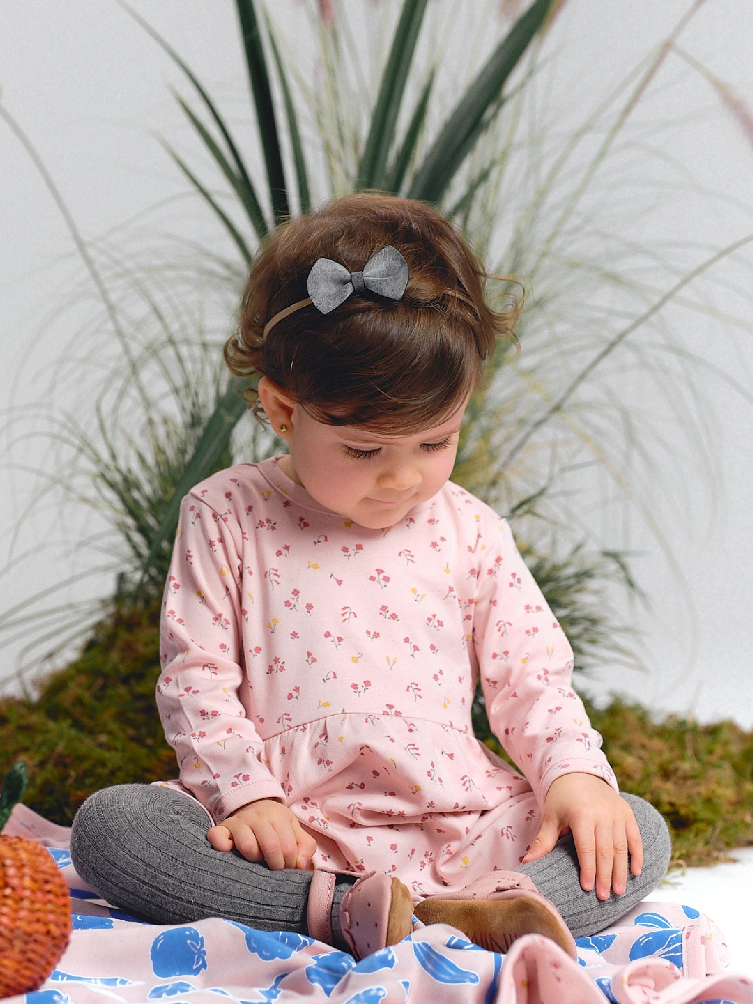 Soft pink dress with delicate floral print.