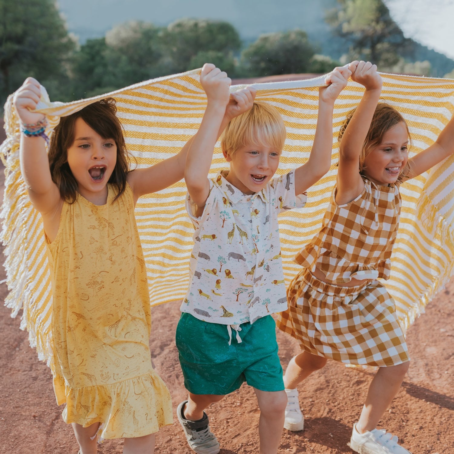 Kids’ clothing collection. Fun and functional outfits for sunny days.