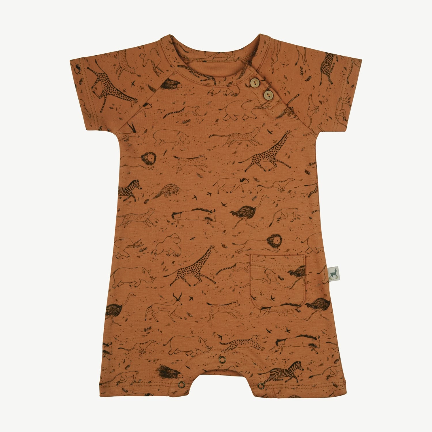 Baby short sleeve jumpsuit in organic Pima cotton, terracotta color, with raglan sleeves, wooden buttons on the shoulder, front pocket, and snap buttons at the inseam. Black African animals print.