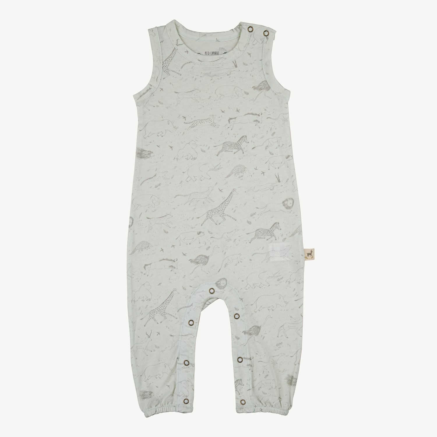 aby sleeveless jumpsuit in organic Pima cotton, bone color, with shoulder buttons and snap buttons at the inseam for easy diaper changes. Subtle African animals print in gray tones.