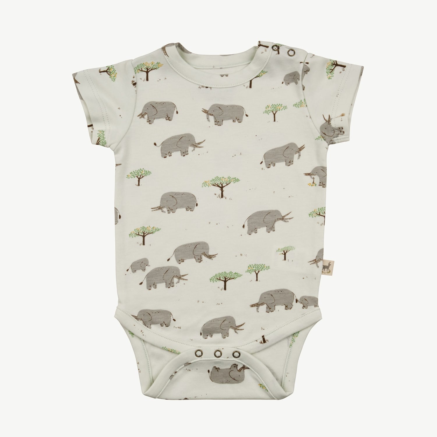 Short-sleeve baby onesie in off-white with an all-over print of grey elephants and green trees, featuring snap closures at the bottom and shoulder.