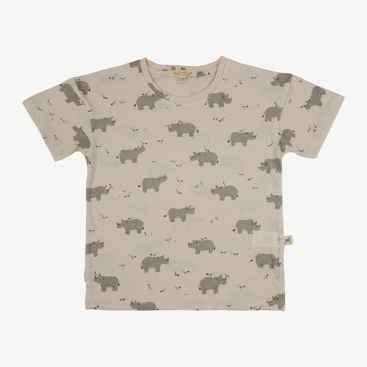 Short-sleeve kids’ t-shirt in beige with an all-over rhino and bird print
