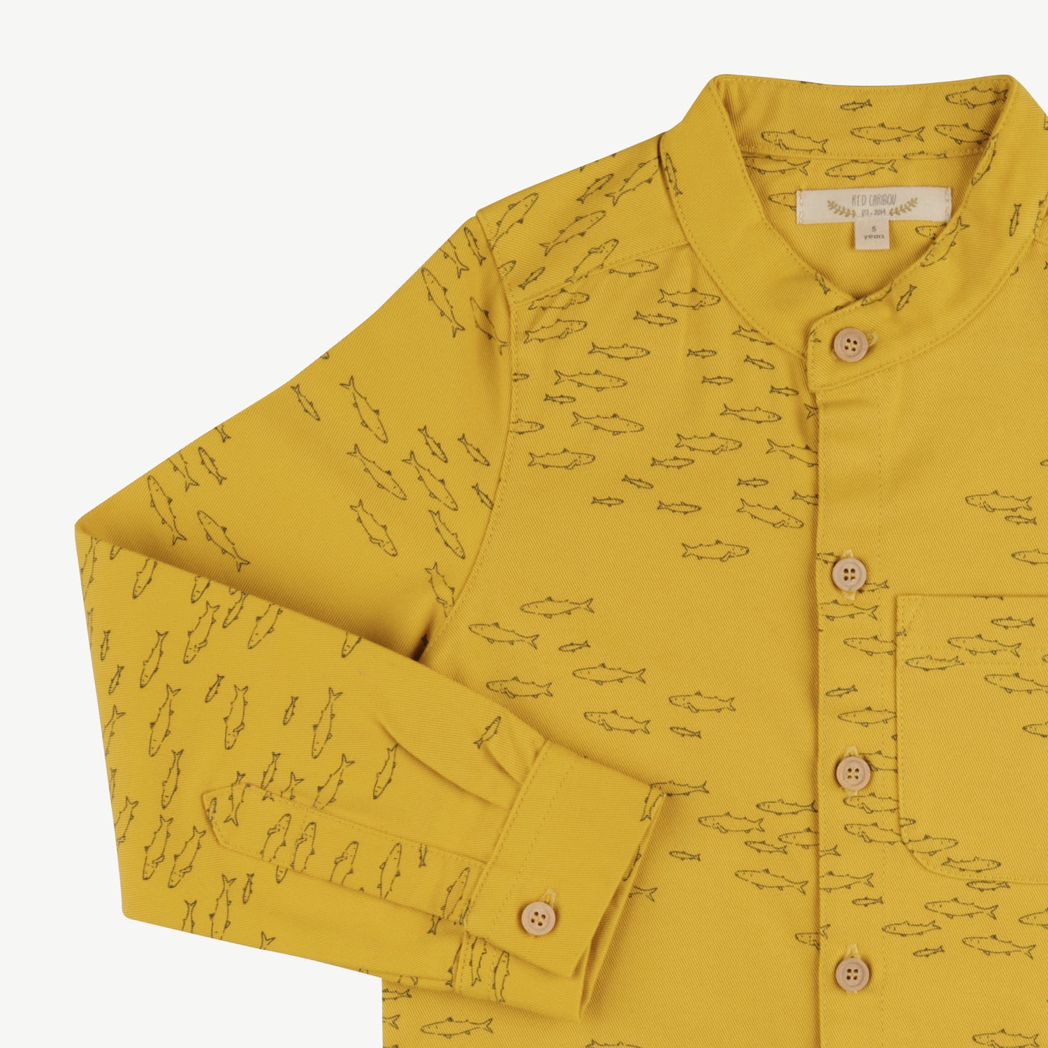 'schooling fish' mustard shirt