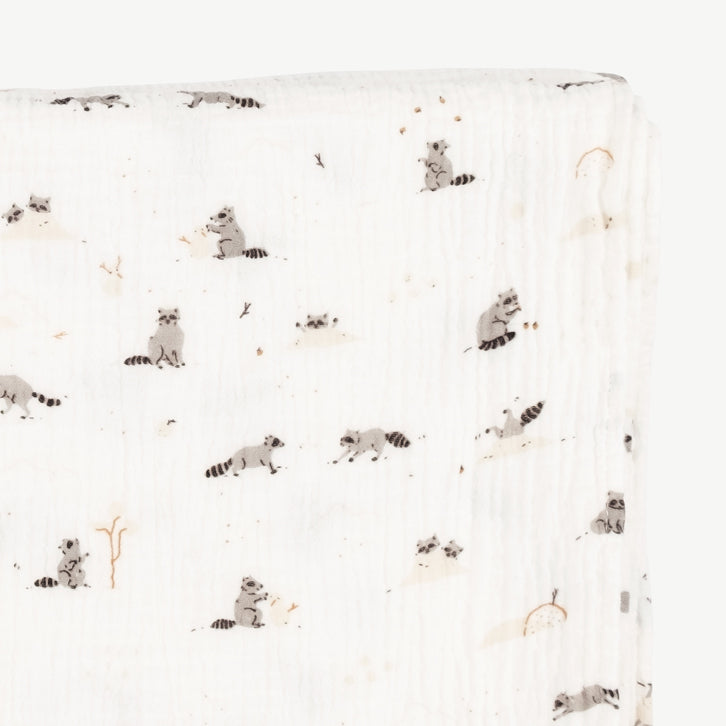 'frolicsome raccoons' ivory swaddle