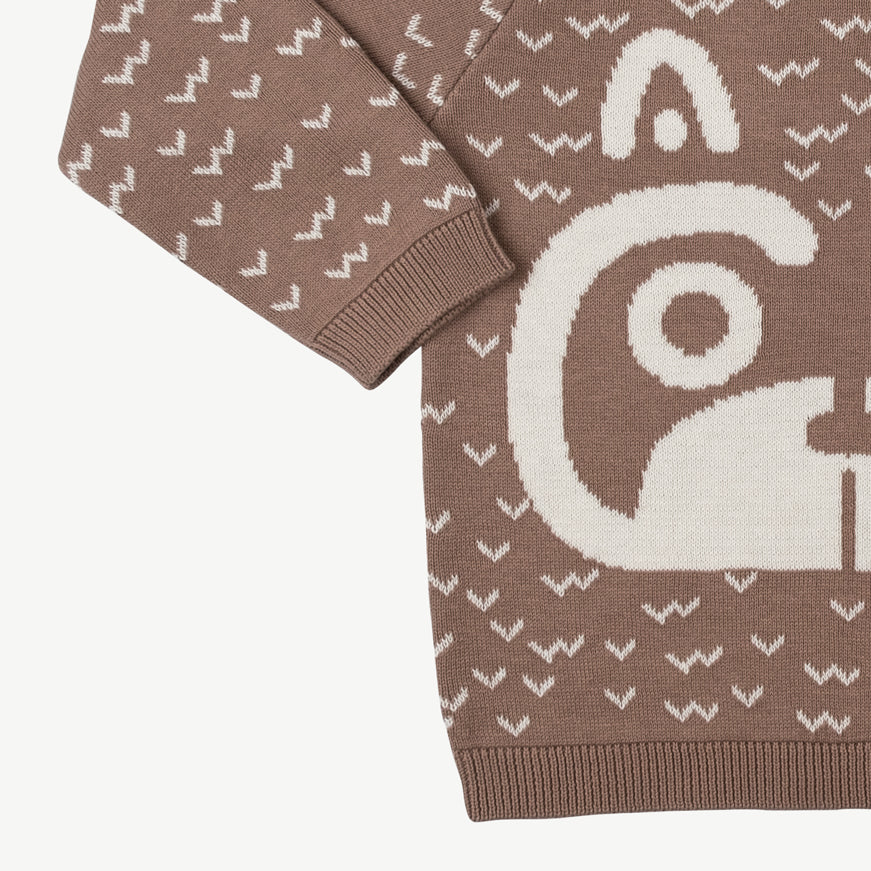 'sneaky racoon' light taupe knit sweater