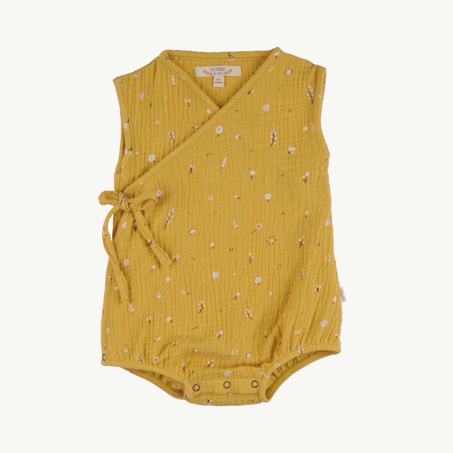 'dusty bloom' amber yellow muslin onesie